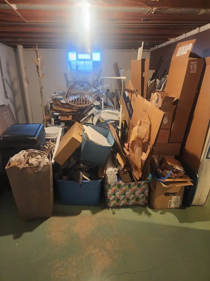 Roll-off dumpster container at job site for 15 Yard Dumpster Rental in Gluckstadt